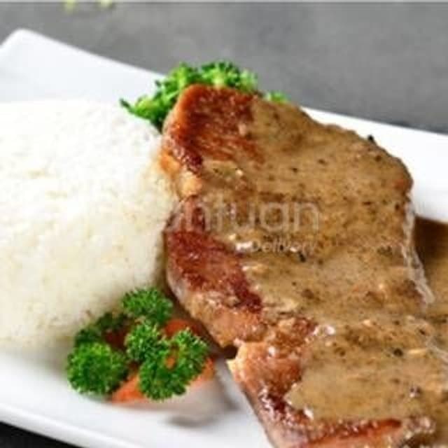 Beef Steak in Black Pepper Sauce on Rice — 黑椒薄牛扒飯